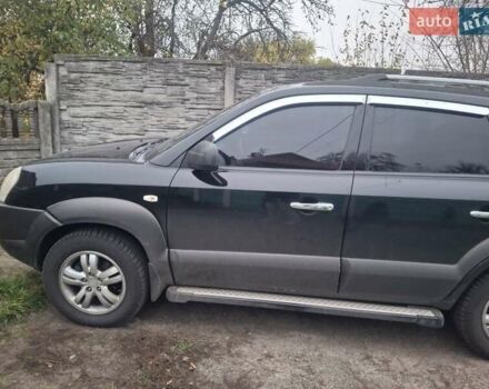 Черный Хендай Туксон, объемом двигателя 2 л и пробегом 224 тыс. км за 6800 $, фото 1 на Automoto.ua