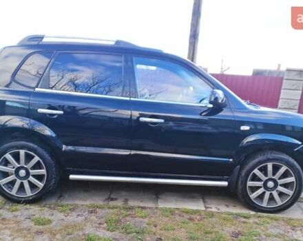 Черный Хендай Туксон, объемом двигателя 2 л и пробегом 208 тыс. км за 6950 $, фото 54 на Automoto.ua