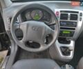 Черный Хендай Туксон, объемом двигателя 2 л и пробегом 208 тыс. км за 6950 $, фото 21 на Automoto.ua