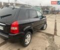 Черный Хендай Туксон, объемом двигателя 2 л и пробегом 190 тыс. км за 7500 $, фото 3 на Automoto.ua