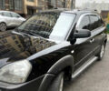 Чорний Хендай Туксон, об'ємом двигуна 1.98 л та пробігом 225 тис. км за 6600 $, фото 3 на Automoto.ua