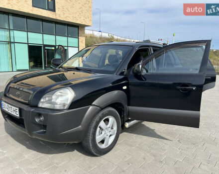 Черный Хендай Туксон, объемом двигателя 2 л и пробегом 255 тыс. км за 6900 $, фото 25 на Automoto.ua
