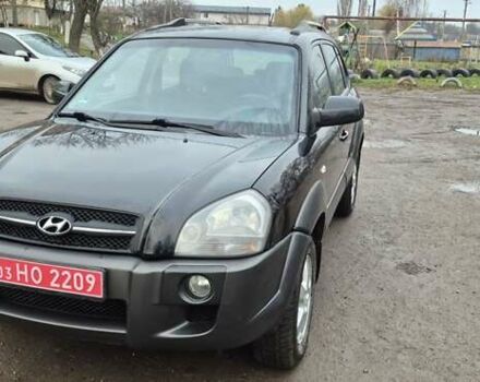 Черный Хендай Туксон, объемом двигателя 1.98 л и пробегом 230 тыс. км за 6390 $, фото 27 на Automoto.ua