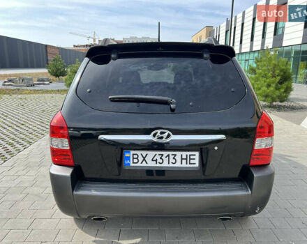 Черный Хендай Туксон, объемом двигателя 2 л и пробегом 255 тыс. км за 6900 $, фото 6 на Automoto.ua