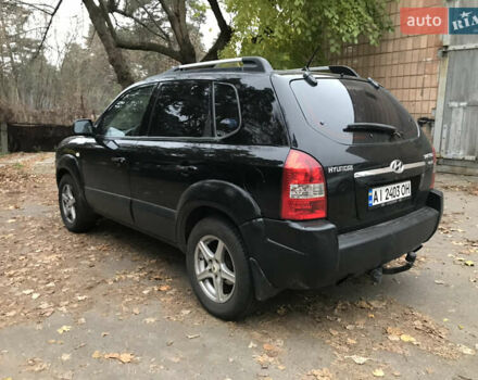 Черный Хендай Туксон, объемом двигателя 2 л и пробегом 261 тыс. км за 6500 $, фото 8 на Automoto.ua