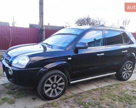 Черный Хендай Туксон, объемом двигателя 2 л и пробегом 208 тыс. км за 6950 $, фото 34 на Automoto.ua