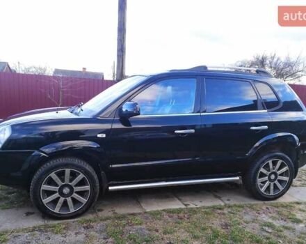 Черный Хендай Туксон, объемом двигателя 2 л и пробегом 208 тыс. км за 6950 $, фото 32 на Automoto.ua