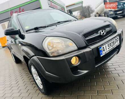 Черный Хендай Туксон, объемом двигателя 1.98 л и пробегом 252 тыс. км за 7300 $, фото 12 на Automoto.ua