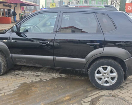 Черный Хендай Туксон, объемом двигателя 2 л и пробегом 217 тыс. км за 7552 $, фото 3 на Automoto.ua
