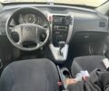 Черный Хендай Туксон, объемом двигателя 2 л и пробегом 290 тыс. км за 4000 $, фото 4 на Automoto.ua