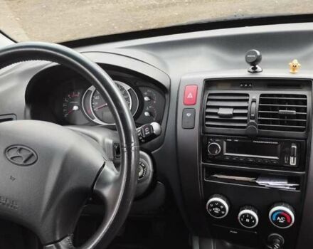 Черный Хендай Туксон, объемом двигателя 1.99 л и пробегом 250 тыс. км за 6650 $, фото 7 на Automoto.ua