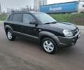 Черный Хендай Туксон, объемом двигателя 2 л и пробегом 180 тыс. км за 4500 $, фото 14 на Automoto.ua