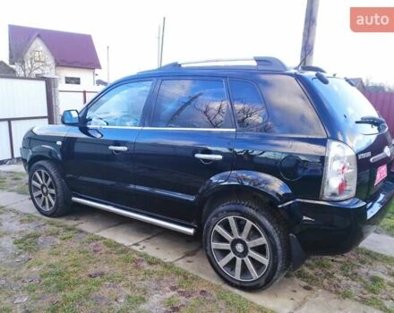 Черный Хендай Туксон, объемом двигателя 2 л и пробегом 208 тыс. км за 6950 $, фото 38 на Automoto.ua