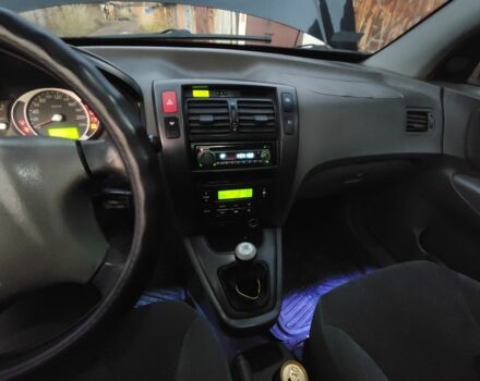 Черный Хендай Туксон, объемом двигателя 2 л и пробегом 370 тыс. км за 3300 $, фото 5 на Automoto.ua