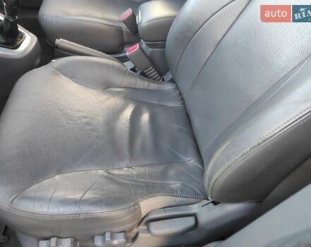 Черный Хендай Туксон, объемом двигателя 2 л и пробегом 208 тыс. км за 6950 $, фото 15 на Automoto.ua