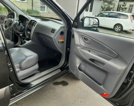 Черный Хендай Туксон, объемом двигателя 2 л и пробегом 252 тыс. км за 7300 $, фото 19 на Automoto.ua