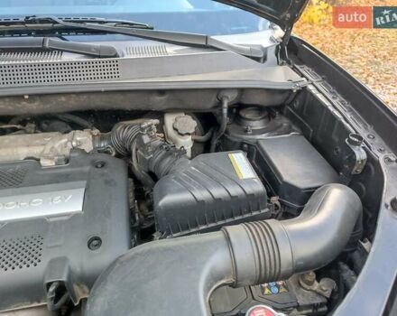 Черный Хендай Туксон, объемом двигателя 1.98 л и пробегом 192 тыс. км за 6900 $, фото 32 на Automoto.ua