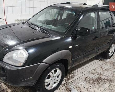 Черный Хендай Туксон, объемом двигателя 2 л и пробегом 284 тыс. км за 4700 $, фото 18 на Automoto.ua