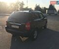 Черный Хендай Туксон, объемом двигателя 2 л и пробегом 253 тыс. км за 7500 $, фото 3 на Automoto.ua
