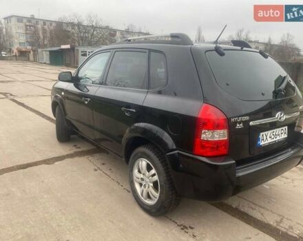 Черный Хендай Туксон, объемом двигателя 2 л и пробегом 190 тыс. км за 7500 $, фото 1 на Automoto.ua