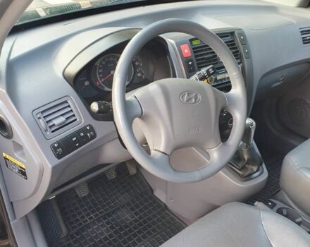 Черный Хендай Туксон, объемом двигателя 2 л и пробегом 137 тыс. км за 7499 $, фото 12 на Automoto.ua