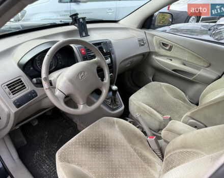 Черный Хендай Туксон, объемом двигателя 2 л и пробегом 211 тыс. км за 4444 $, фото 8 на Automoto.ua