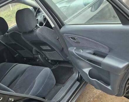 Черный Хендай Туксон, объемом двигателя 1.98 л и пробегом 230 тыс. км за 6390 $, фото 22 на Automoto.ua