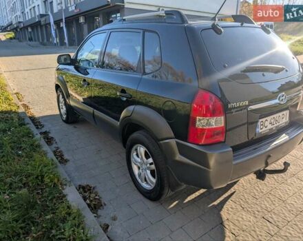Черный Хендай Туксон, объемом двигателя 1.98 л и пробегом 226 тыс. км за 6500 $, фото 5 на Automoto.ua