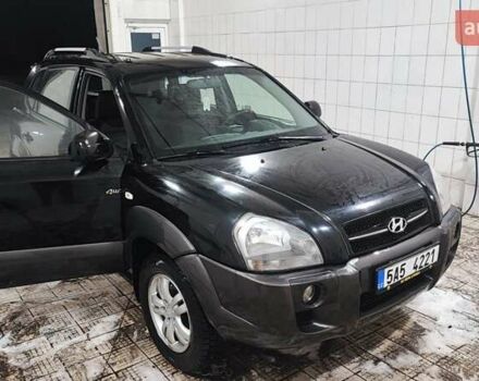 Черный Хендай Туксон, объемом двигателя 2 л и пробегом 284 тыс. км за 4700 $, фото 16 на Automoto.ua