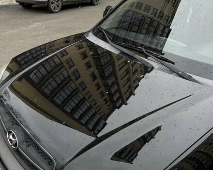 Чорний Хендай Туксон, об'ємом двигуна 1.98 л та пробігом 225 тис. км за 6600 $, фото 7 на Automoto.ua