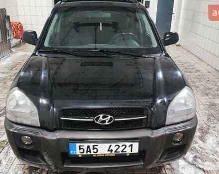 Черный Хендай Туксон, объемом двигателя 2 л и пробегом 284 тыс. км за 4700 $, фото 19 на Automoto.ua