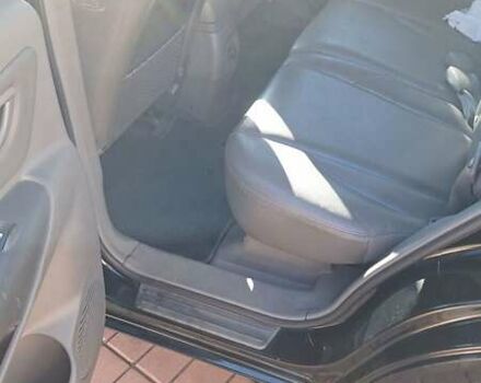 Чорний Хендай Туксон, об'ємом двигуна 1.98 л та пробігом 229 тис. км за 7400 $, фото 9 на Automoto.ua