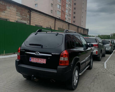Черный Хендай Туксон, объемом двигателя 2 л и пробегом 270 тыс. км за 6300 $, фото 5 на Automoto.ua