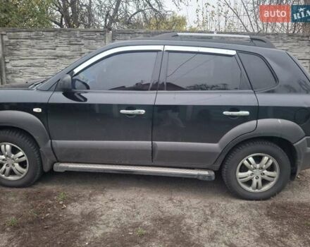 Черный Хендай Туксон, объемом двигателя 2 л и пробегом 224 тыс. км за 6800 $, фото 6 на Automoto.ua