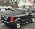 Черный Хендай Туксон, объемом двигателя 2 л и пробегом 257 тыс. км за 6800 $, фото 18 на Automoto.ua