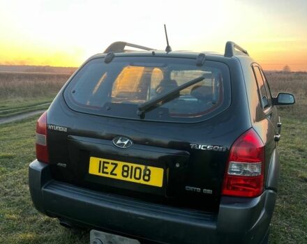 Черный Хендай Туксон, объемом двигателя 2 л и пробегом 137 тыс. км за 4300 $, фото 6 на Automoto.ua