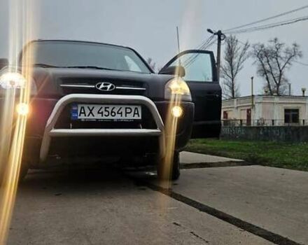 Черный Хендай Туксон, объемом двигателя 2 л и пробегом 190 тыс. км за 7500 $, фото 20 на Automoto.ua