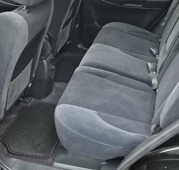 Черный Хендай Туксон, объемом двигателя 1.98 л и пробегом 230 тыс. км за 6390 $, фото 25 на Automoto.ua