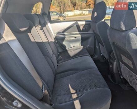 Черный Хендай Туксон, объемом двигателя 1.98 л и пробегом 226 тыс. км за 6500 $, фото 3 на Automoto.ua