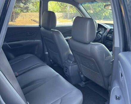 Хендай Туксон 2005 у Вознесенске на Automoto.ua Чорний Хендай Туксон, об'ємом двигуна 1.98 л та пробігом 144 тис. км за 7500 $, фото 11 на Automoto.ua