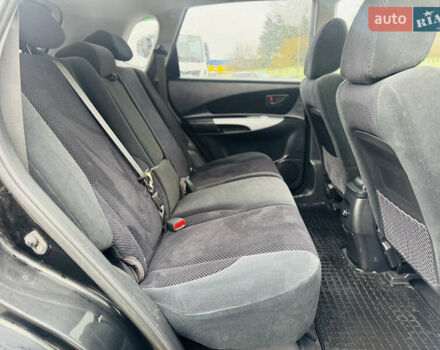 Черный Хендай Туксон, объемом двигателя 1.98 л и пробегом 252 тыс. км за 7300 $, фото 20 на Automoto.ua