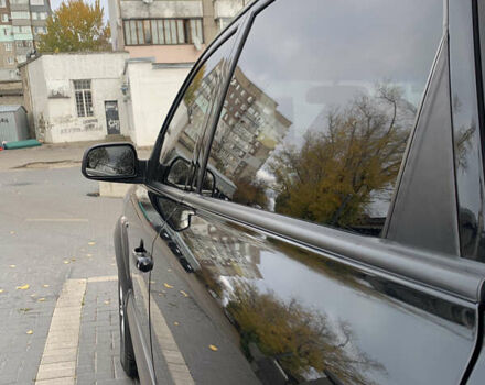 Черный Хендай Туксон, объемом двигателя 2 л и пробегом 219 тыс. км за 8400 $, фото 7 на Automoto.ua