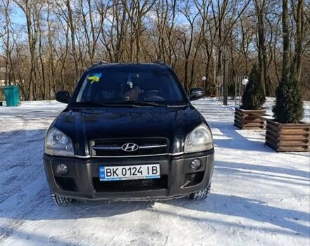 Черный Хендай Туксон, объемом двигателя 1.98 л и пробегом 285 тыс. км за 5600 $, фото 14 на Automoto.ua