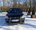 Черный Хендай Туксон, объемом двигателя 1.98 л и пробегом 285 тыс. км за 5600 $, фото 14 на Automoto.ua