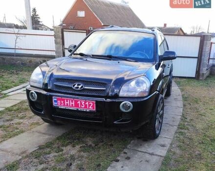 Черный Хендай Туксон, объемом двигателя 2 л и пробегом 208 тыс. км за 6950 $, фото 2 на Automoto.ua
