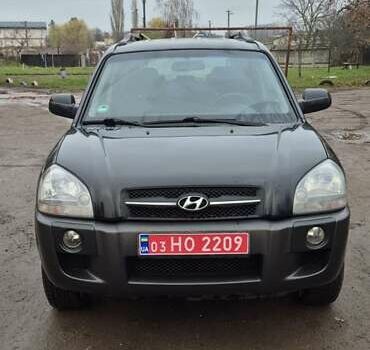 Черный Хендай Туксон, объемом двигателя 1.98 л и пробегом 230 тыс. км за 6390 $, фото 1 на Automoto.ua
