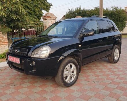 Черный Хендай Туксон, объемом двигателя 2 л и пробегом 137 тыс. км за 7499 $, фото 2 на Automoto.ua