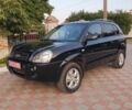 Черный Хендай Туксон, объемом двигателя 2 л и пробегом 137 тыс. км за 7499 $, фото 2 на Automoto.ua