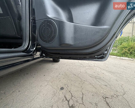 Черный Хендай Туксон, объемом двигателя 1.98 л и пробегом 215 тыс. км за 8600 $, фото 10 на Automoto.ua