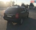 Черный Хендай Туксон, объемом двигателя 1.98 л и пробегом 252 тыс. км за 8150 $, фото 5 на Automoto.ua